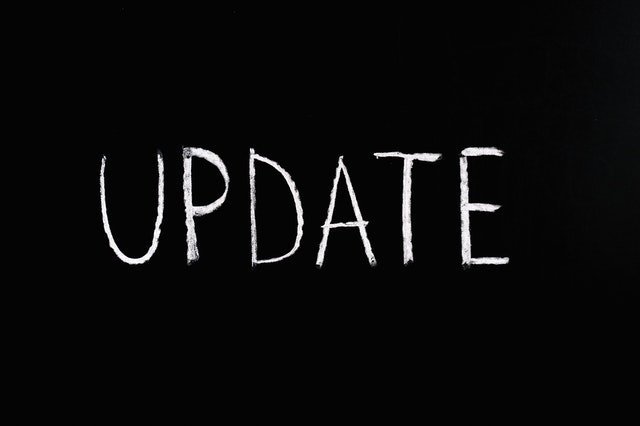 Update Schriftzug auf schwarzem Grund